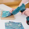 Doulami 100W Cordless Hot Glue Gun with 2.5A Battery and 40 Pcs Glue Sticks Perfect for Crafts