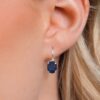 Gem Stone King 925 Sterling Silver Oval Cabochon White Simulated Opal Earrings for Women (2.10 Cttw, Oval 8X6MM)