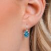 Gem Stone King 925 Sterling Silver Oval Cabochon White Simulated Opal Earrings for Women (2.10 Cttw, Oval 8X6MM)
